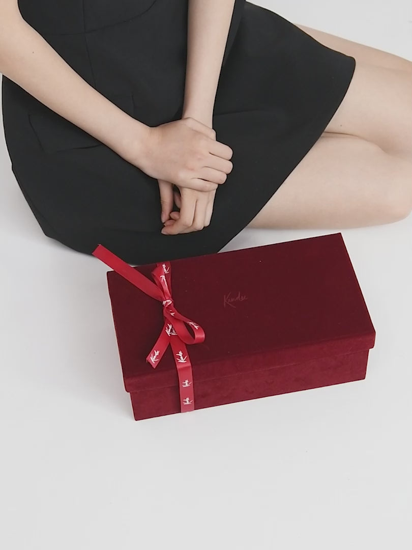 Top view of vintage-inspired leather mules with soft curved lines
