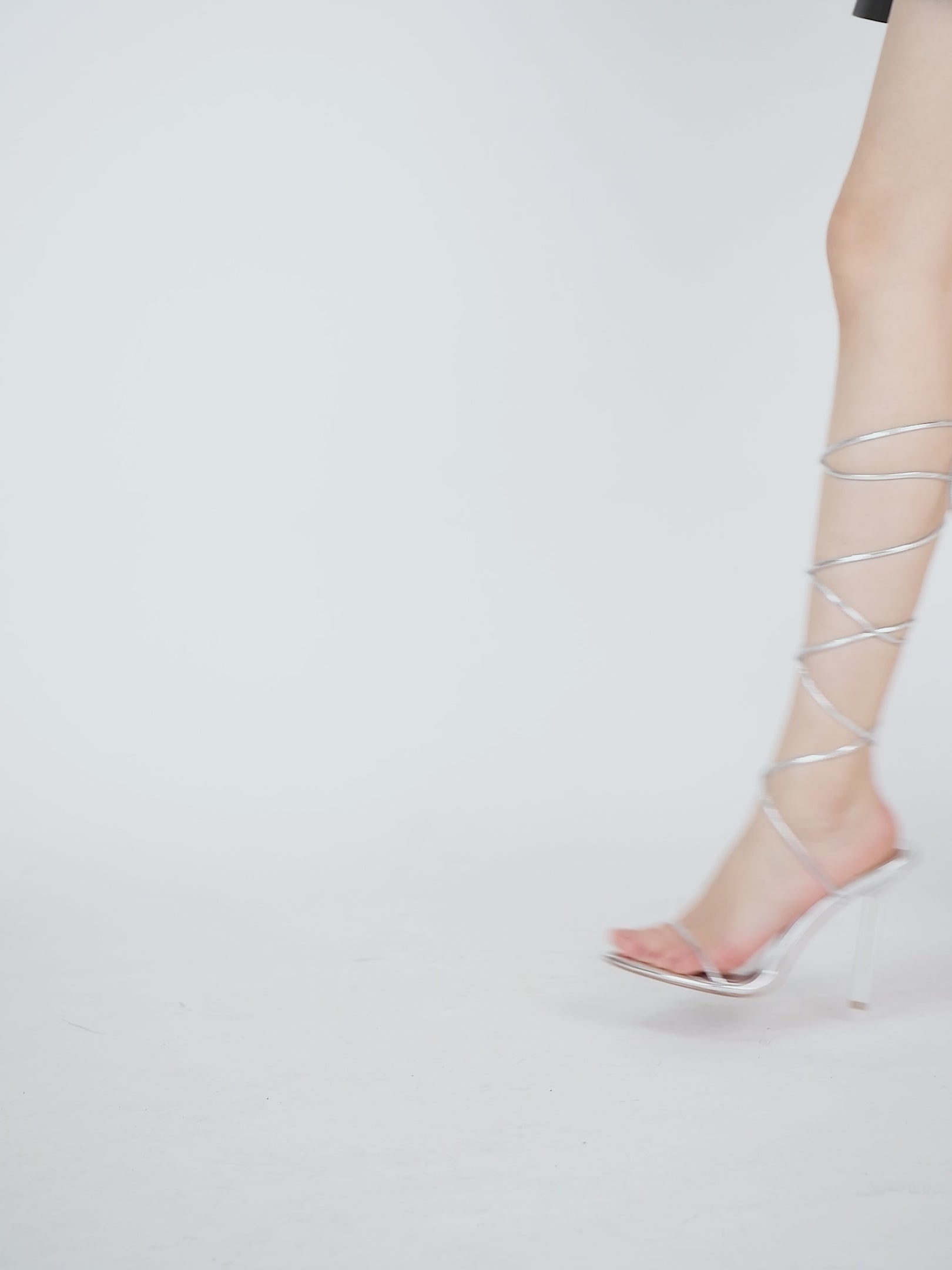 Vegan silver sandals with sleek design and square toe in patent mirror material