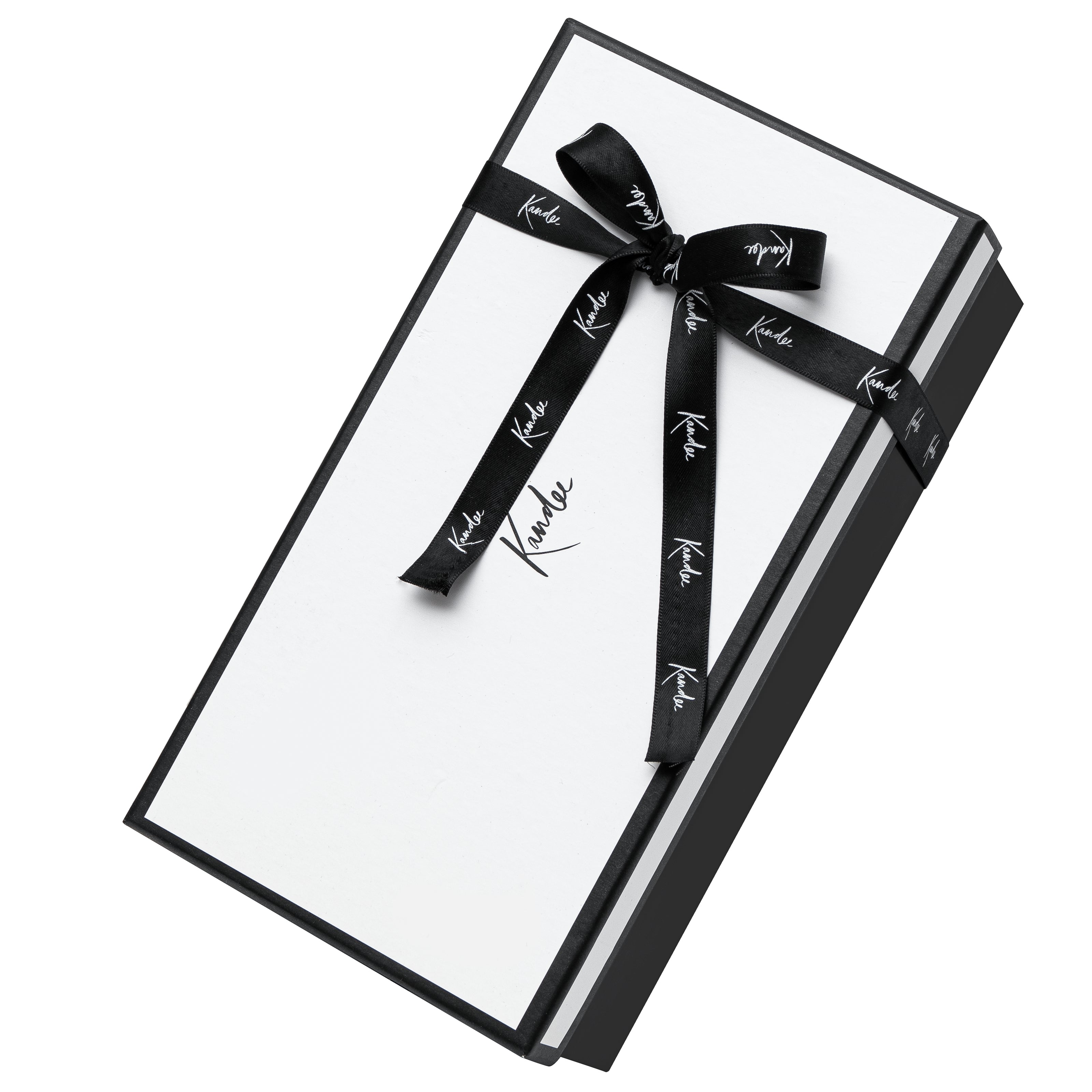 Elegant designer shoe box with structured shape, smooth finish, and refined detailing, perfect for luxury presentation