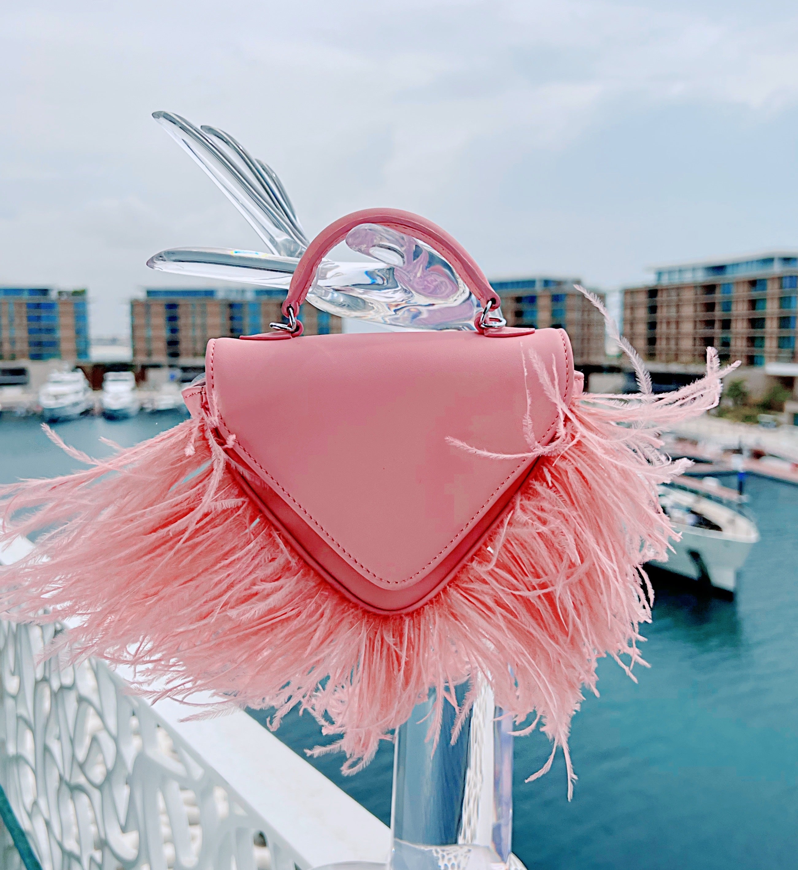 Pink best sale feather purse